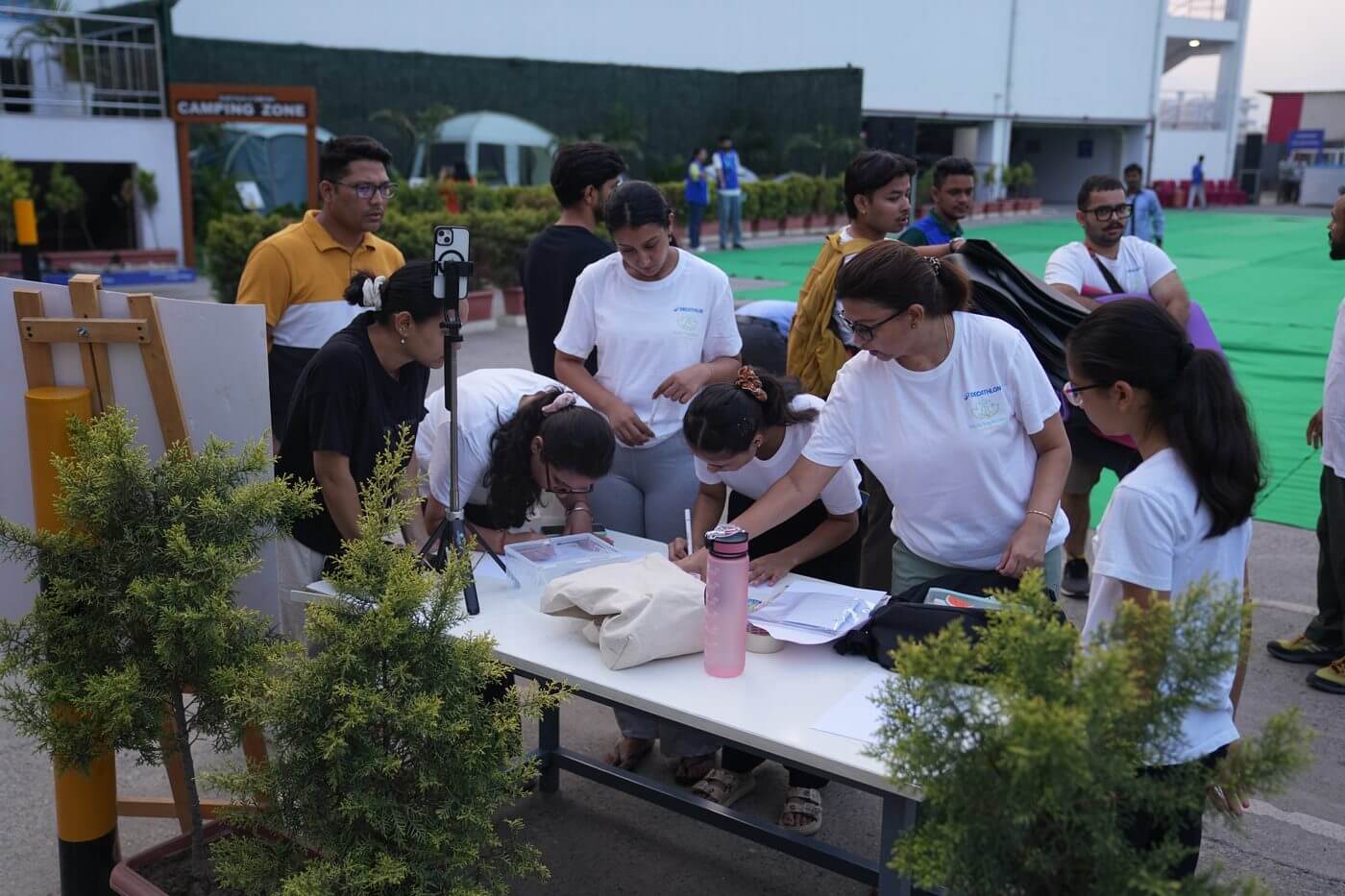 VYK team at registration desk — International Yoga Day 2026 Decathlon Dehradun