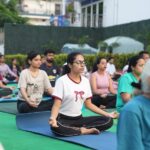 Participants practicing meditation and pranayama during an International Yoga Day 2026 outdoor yoga session on June 21, promoting mindfulness, breathing exercises, and holistic wellness.