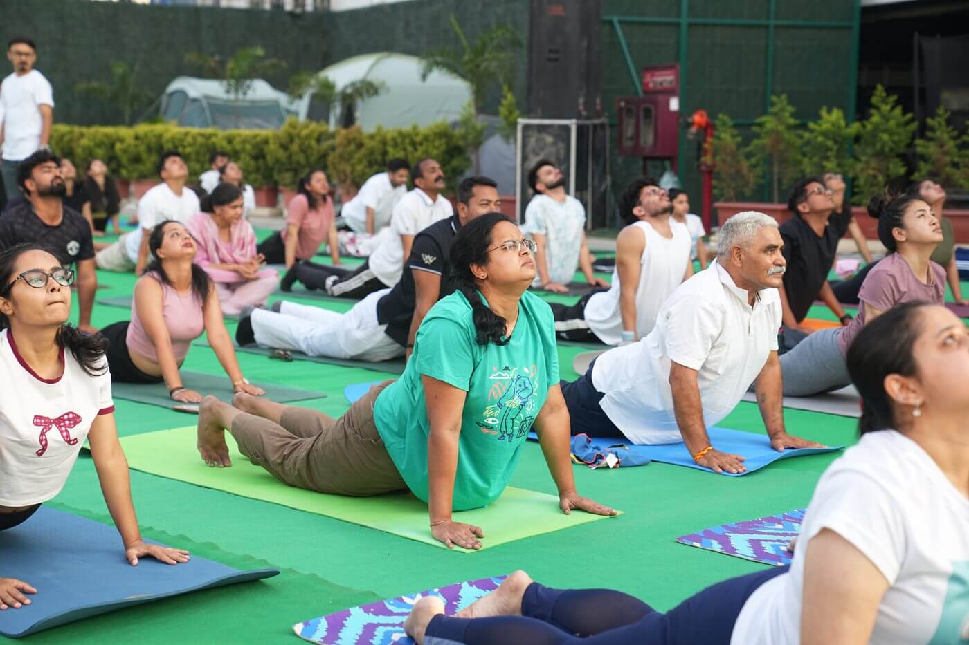 Group back exercise at IYD 2026 Decathlon Dehradun